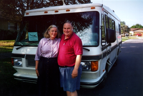 Tom and Maren outside their Aero Cruiser motor home in Florida